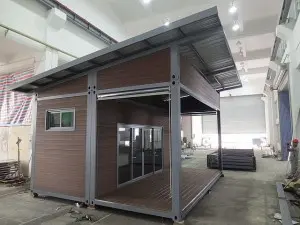 Flat pack low cost fast built container house for labor camp.